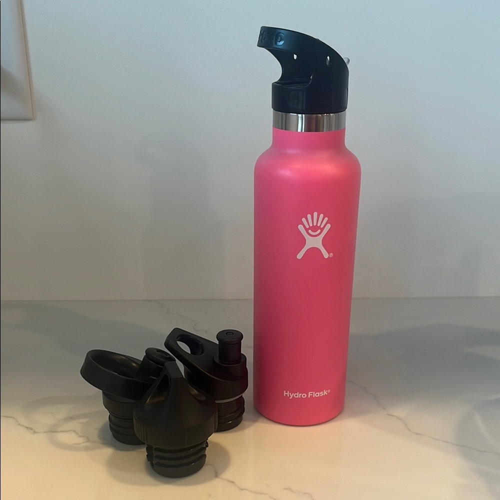 21 oz Hydro Flask Pink Water Bottle with 3 extra variety lids